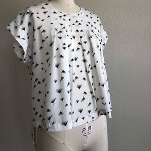 While blouse with dandelion figures